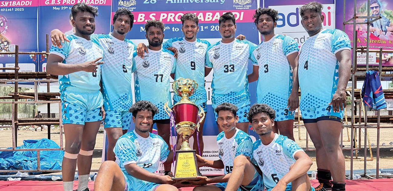 Adani Foundation-supported Kabaddi tournament winning team with their trophy