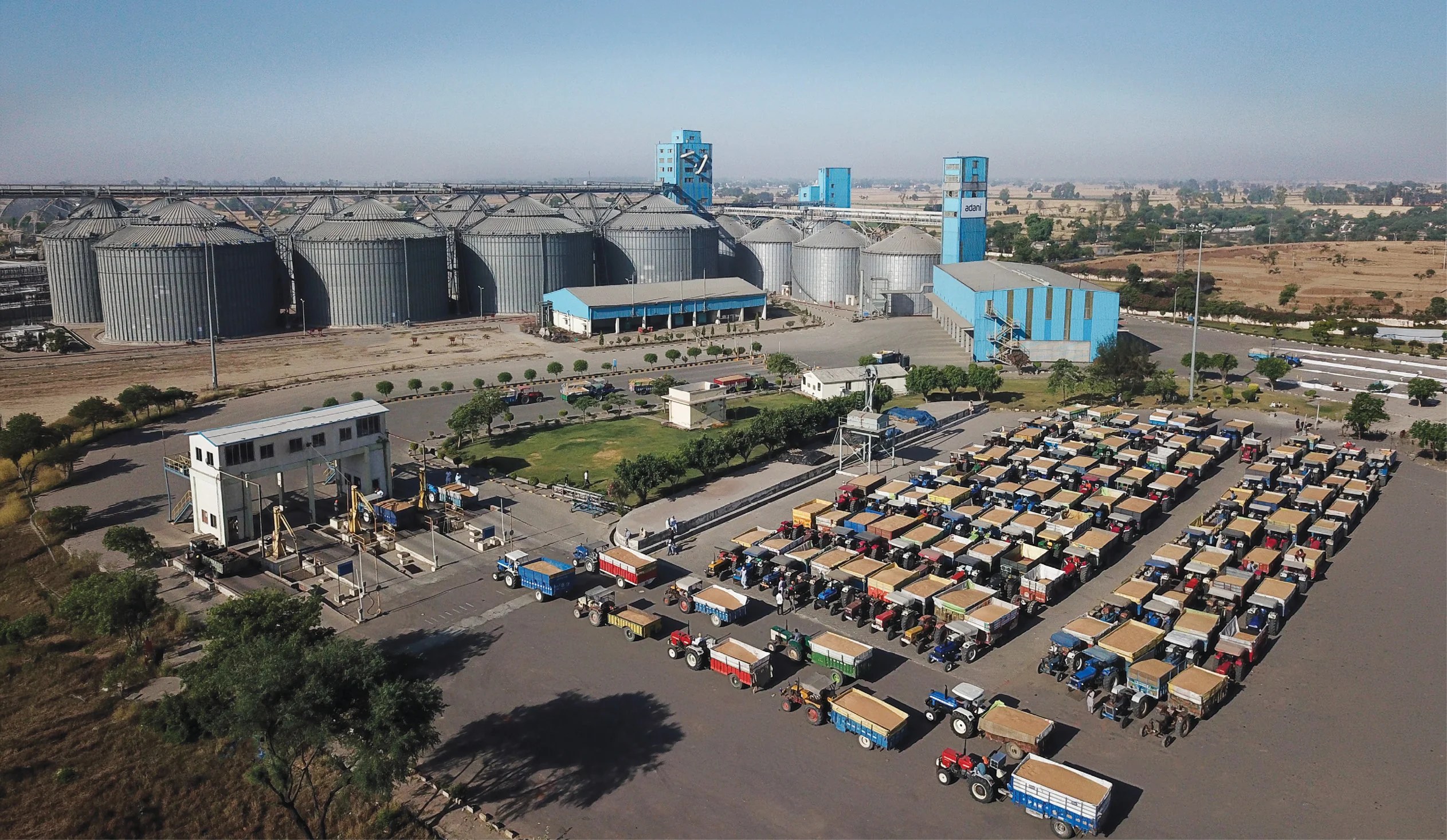 Aerial view of an Adani agri-logistics silo complex