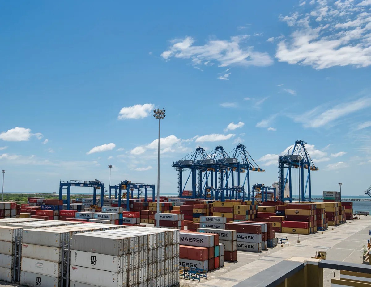 APSEZ port with container terminal and quay cranes
